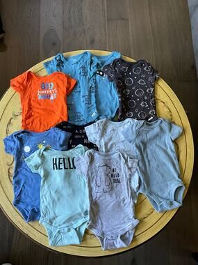 Assorted 6-9 months gender neutral baby onesies